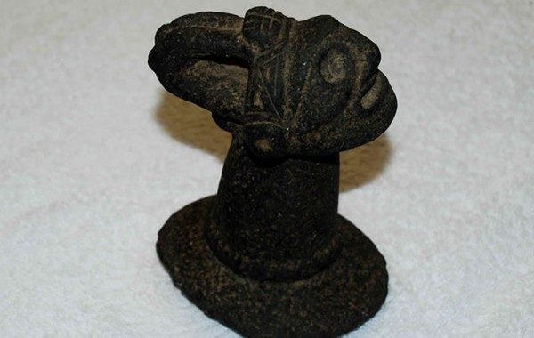 Stone pestle with anthropomorphic decoration