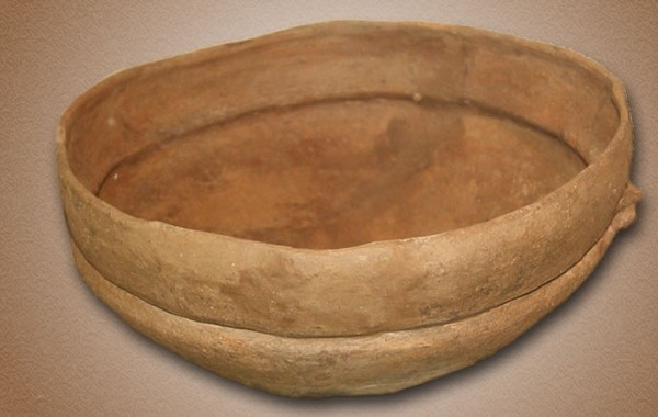 Ceramic pot with bilateral anthropomorphic handles